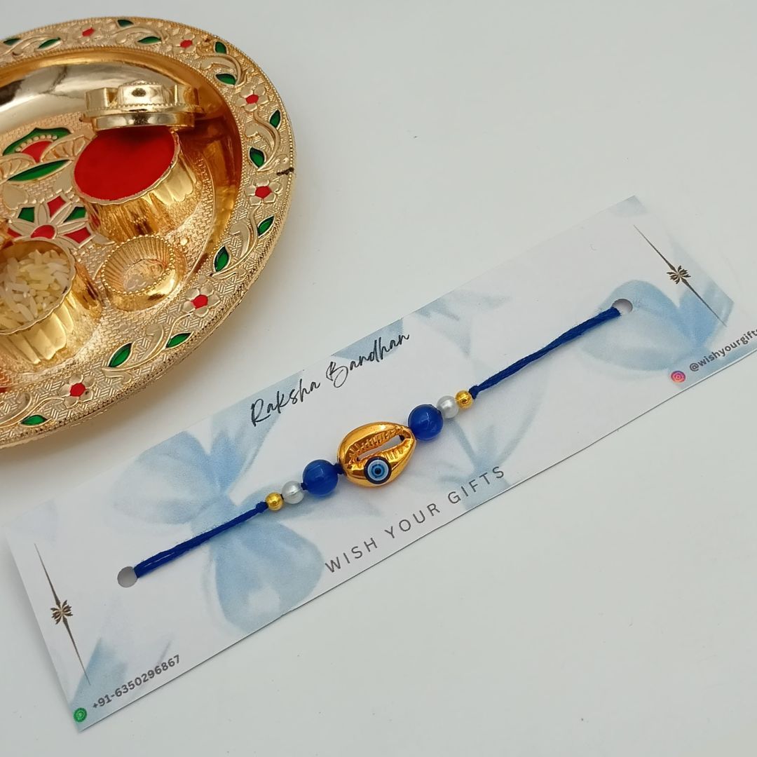 Golden Shell Evil Eye Rakhi