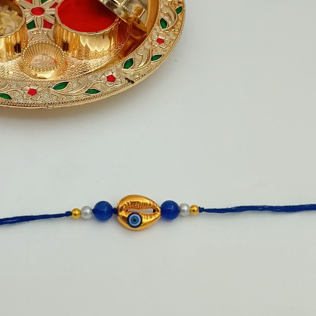 Golden Shell Evil Eye Rakhi