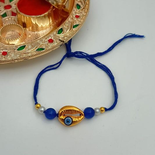 Golden Shell Evil Eye Rakhi