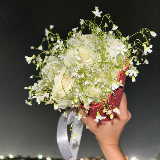 Artificial White Flowers Wrap In Red Glitter Sheet